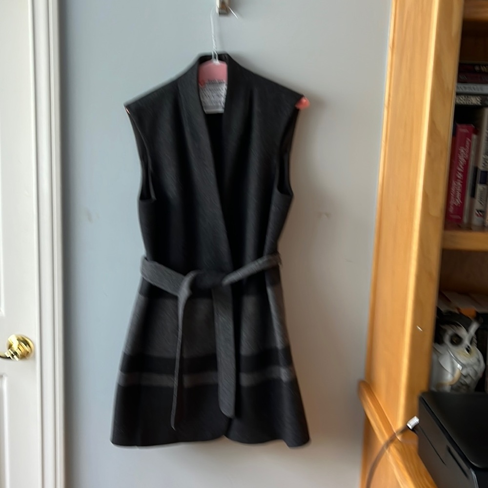 Dark gray vest with details